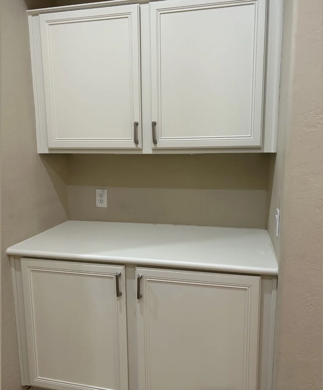 White built-in cabinets and counter