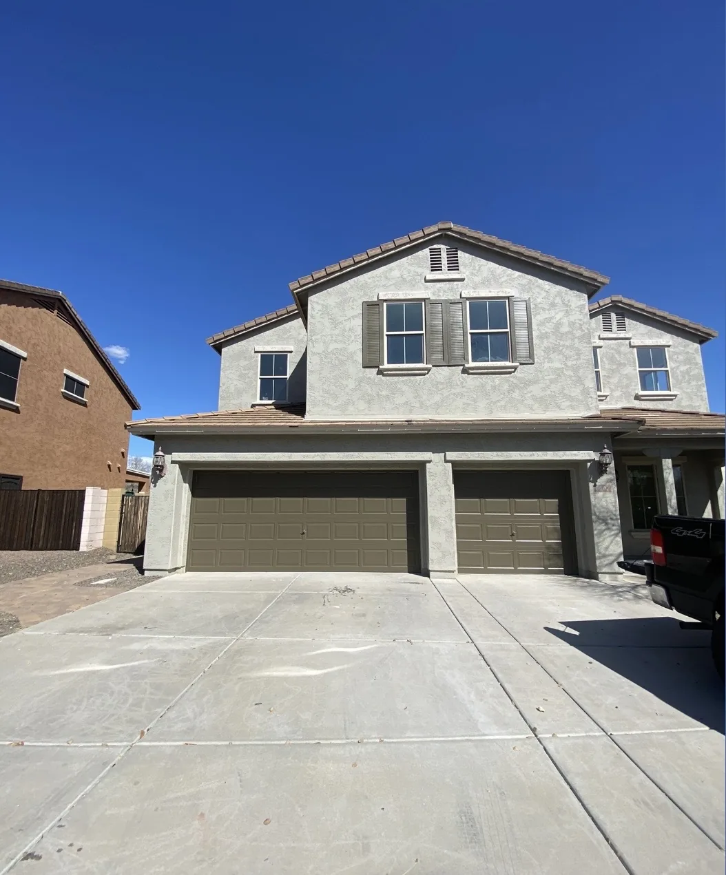Two-story home with a wide garage